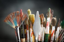 brushes-and-paints-for-painting-on-an-old-background